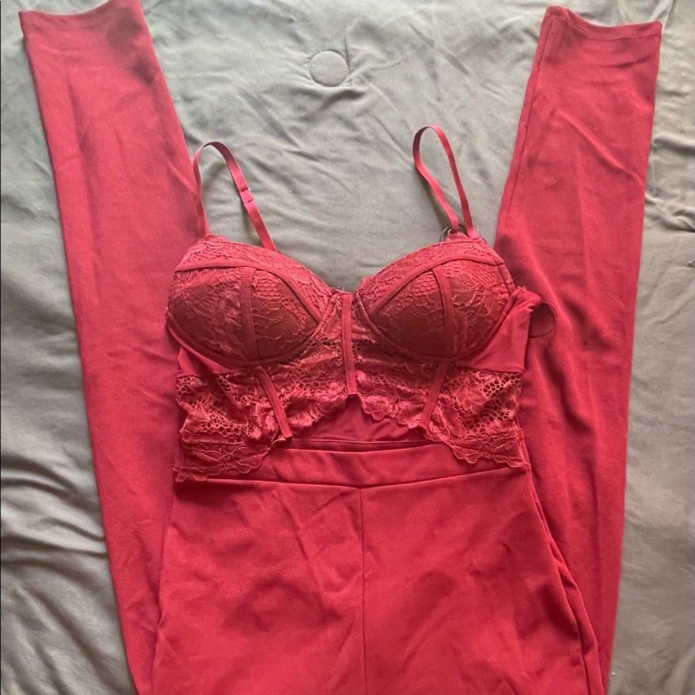 Burgundy jumpsuit with lace.